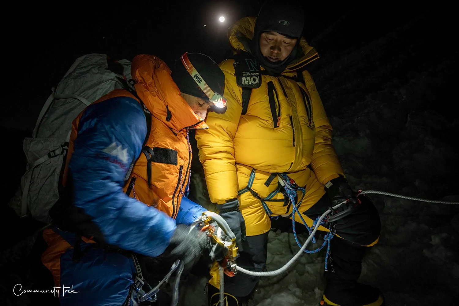 Mountain guide and client climbing Lobuche Peak in Nepal