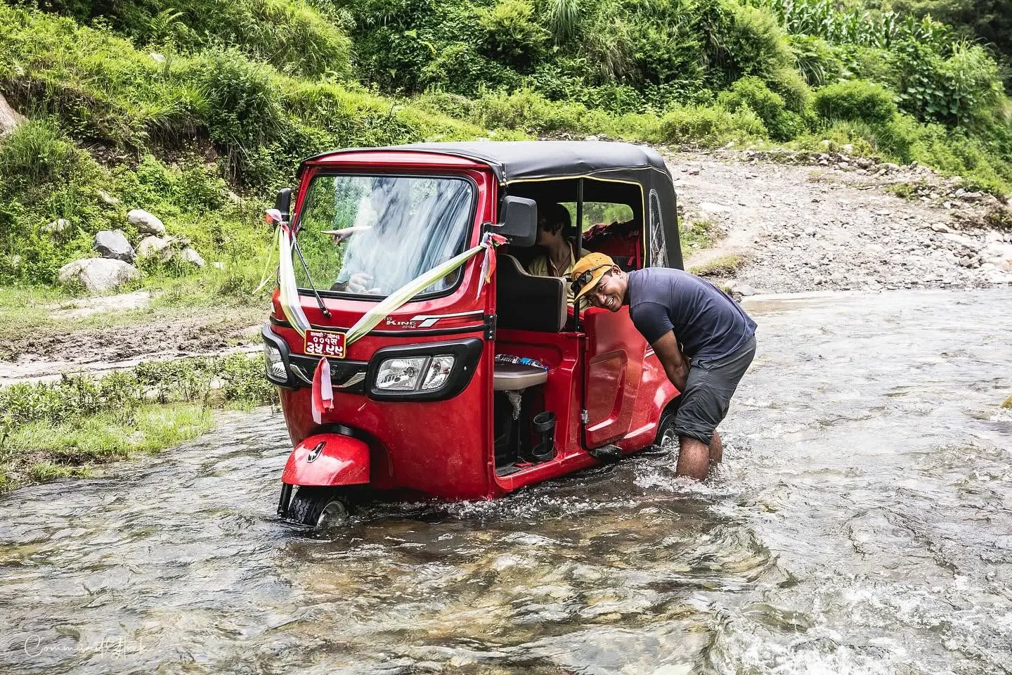 Mountain Tuk-Tuk ride toward Mohani Jharna, with our Tuk-Tuk stopped in the middle of a river crossing.